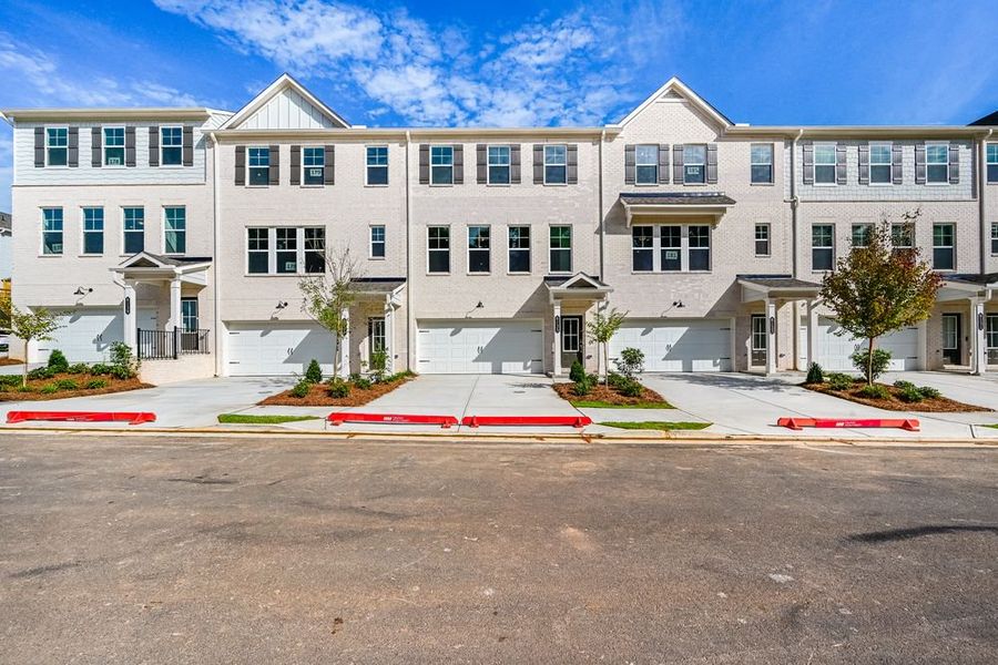 Front exterior of a new home in Chandler Run, Tucker, GA, highlighting curb appeal (Image 2).