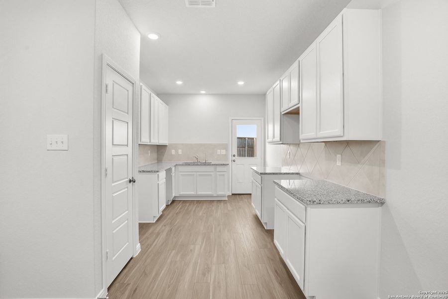Furnished interior view inside a new home in Katzer Ranch, Converse (Image 9).