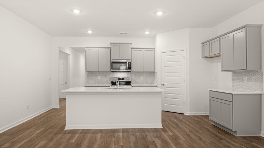 Representative furnished interior of a home built from the Cali by D.R. Horton in The Reserve at Calcutta, Stockbridge (Image 6).