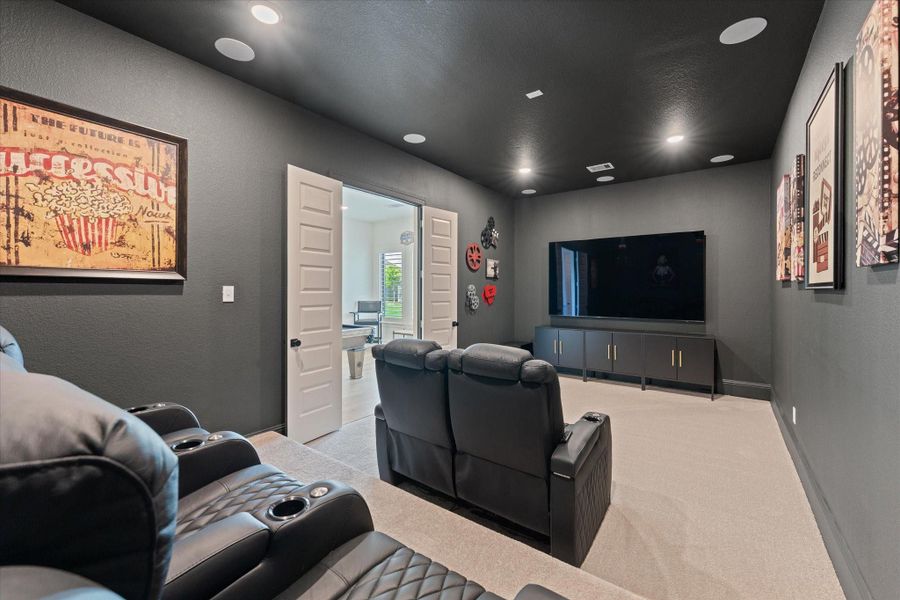 Featuring surround sound, elevated seating, and dramatic finishes, this space is perfect for movie nights, sports viewing, or immersive entertainment.