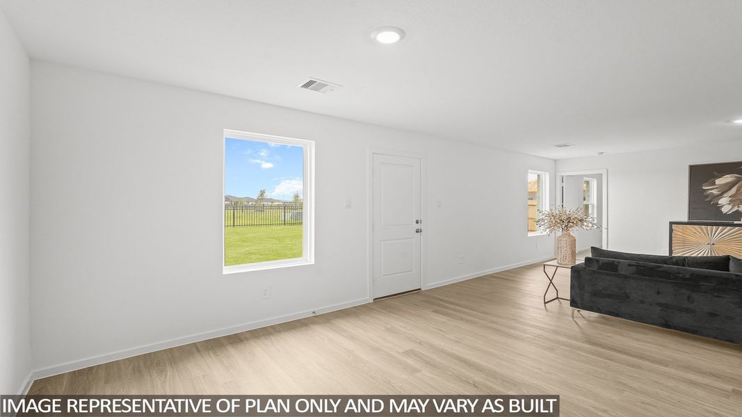 Spacious, unfurnished interior of a new home in Sunterra, Katy (Image 11).