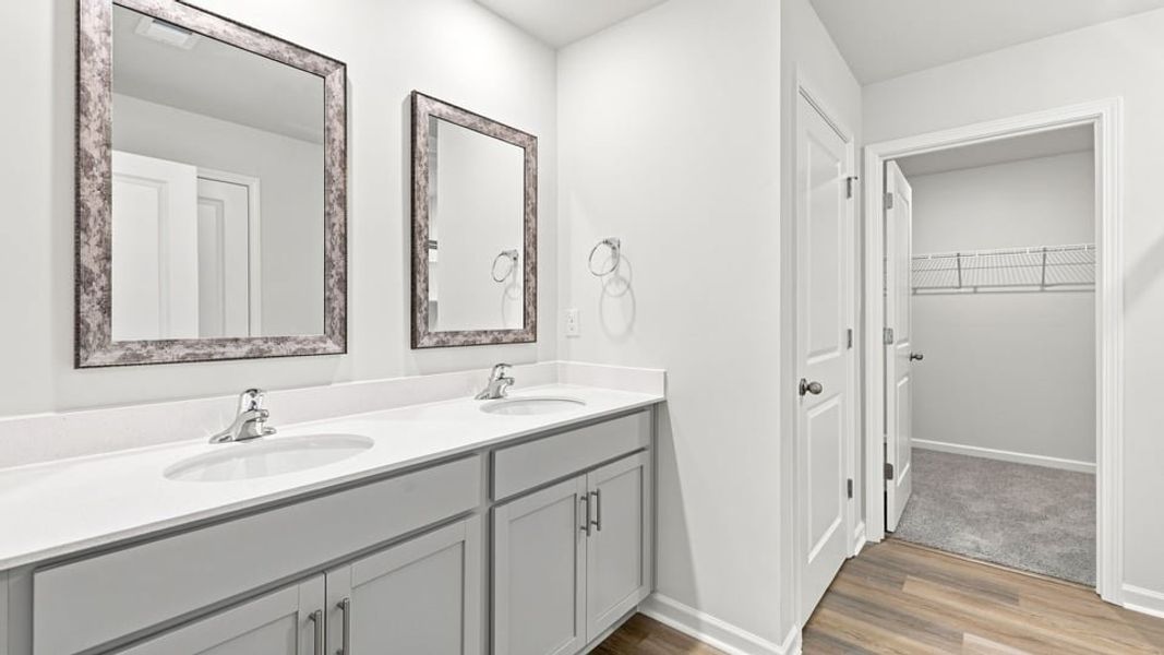 Furnished interior view inside a new home in Bentley Park, Greenwood (Image 11).