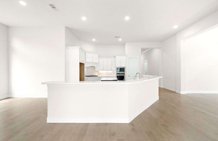 Representative furnished interior of a home built from the 2855AU by Ravenna Homes in Audubon 60′, Magnolia (Image 16).
