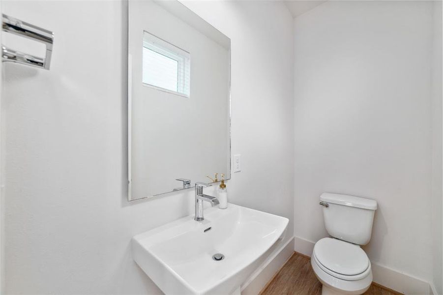 Half Bath Located On The First Floor Is Convenient For All Your Guests