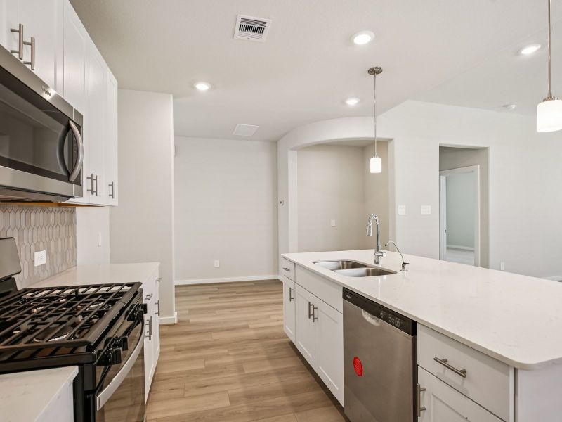 Furnished interior view inside a new home in Sundance Cove - Premier Series, Crosby (Image 5).