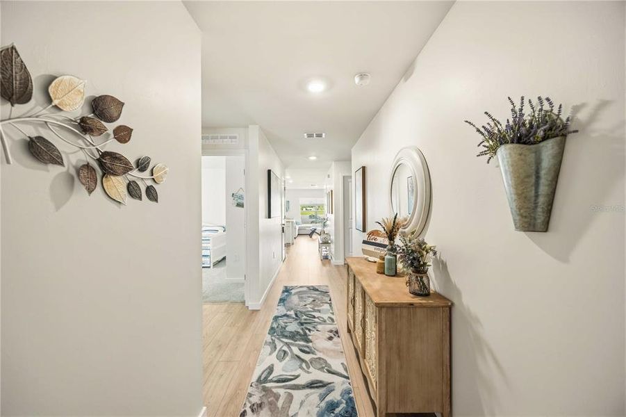 Furnished interior view inside a new home in Central Parc, North Port (Image 18).
