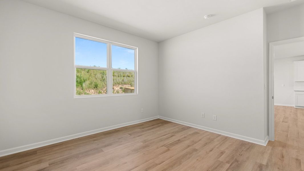 Representative unfurnished interior of a home built from the Freeport by D.R. Horton in Hamptons at Riverwood North, Dallas (Image 24).