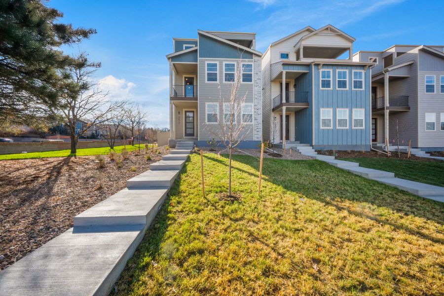 Front exterior of a new home in Pony Park, Colorado Springs, CO, highlighting curb appeal (Image 2).