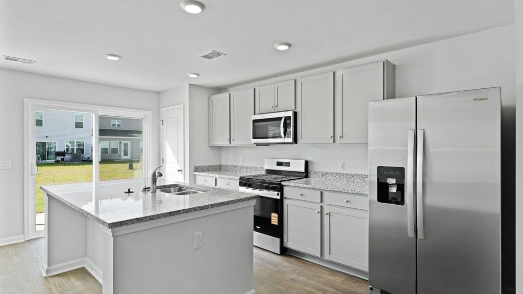 Furnished interior view inside a new home in Pine Hills Townhomes at Cane Bay, Summerville (Image 4).