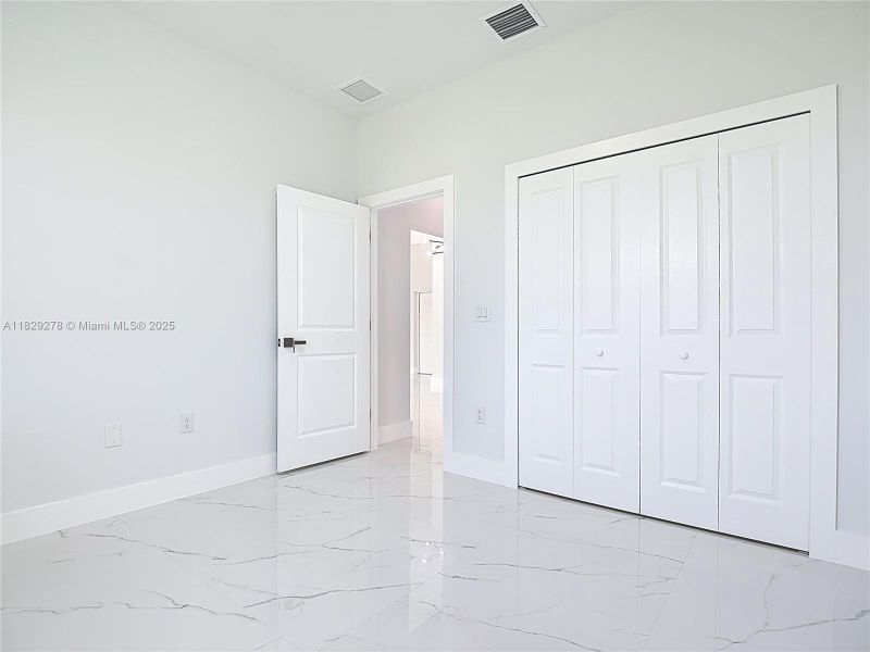 Spacious, unfurnished interior of a new home in , Lehigh Acres (Image 37).