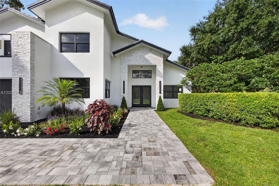 Front exterior of a new home in , Palm Beach Gardens, FL, highlighting curb appeal (Image 30).