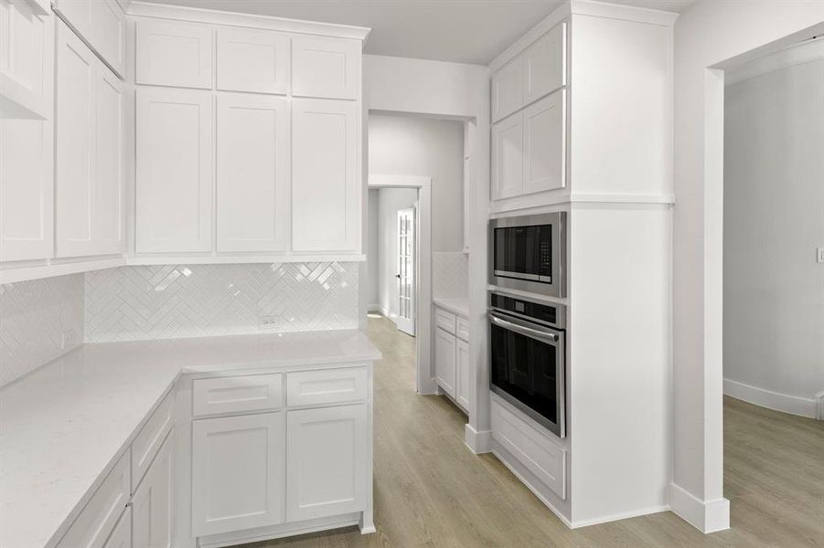 Furnished interior view inside a new home in Valencia on The Lake, Little Elm (Image 9).