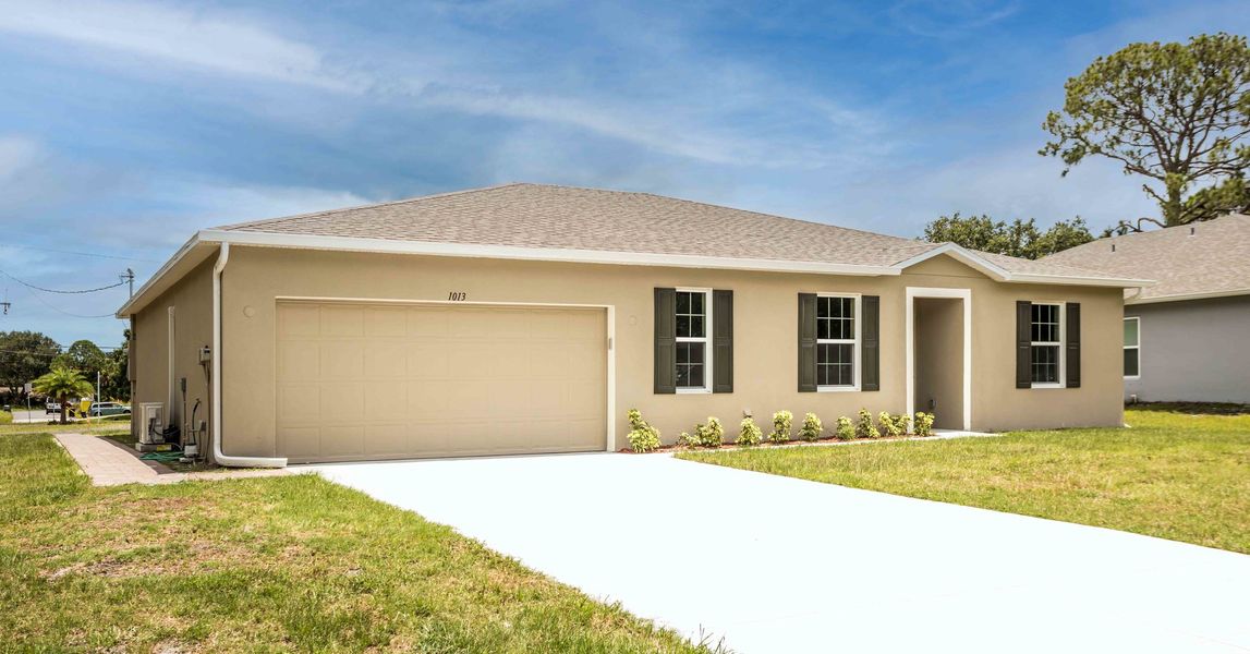 Representative exterior photo of a completed home built from the Willow by Maronda Homes in Coastal Communities, Edgewater, FL (Image 17).