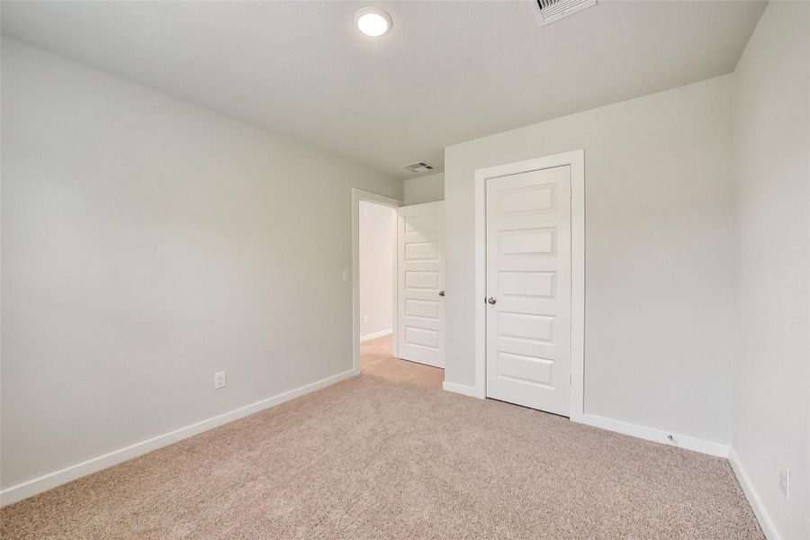 Spacious, unfurnished interior of a new home in Lakes at Black Oak, Magnolia (Image 31).