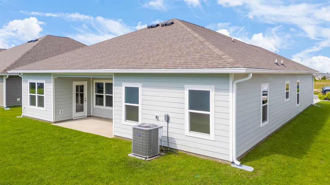 Representative exterior photo of a completed home built from the The Madison by D.R. Horton in Titus Park, Panama City, FL (Image 23).
