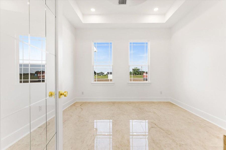 Spacious bedroom filled with natural light. Spacious bedroom filled with natural light.