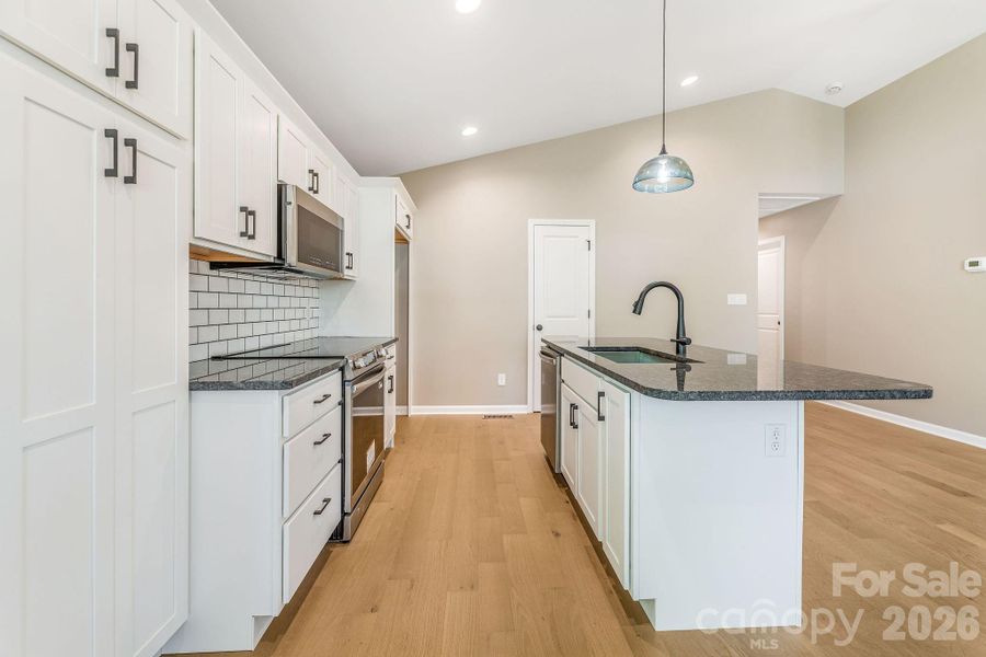 Furnished interior view inside a new home in , Waynesville (Image 8).