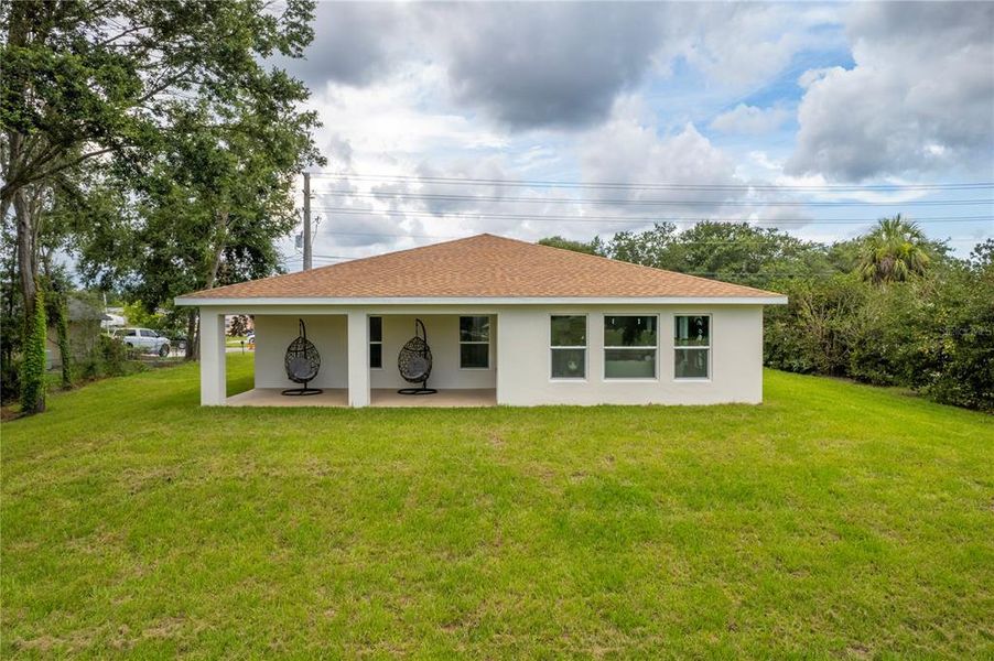 Front exterior of a new home in , Spring Hill, FL, highlighting curb appeal (Image 25).