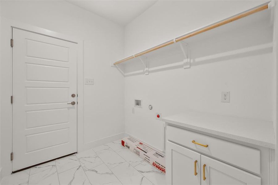 Utility room with built in cabinets