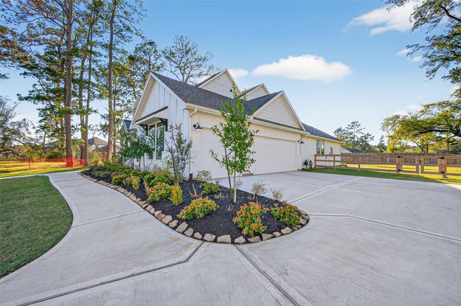 Front exterior of a new home in Sorella, Tomball, TX, highlighting curb appeal (Image 26).