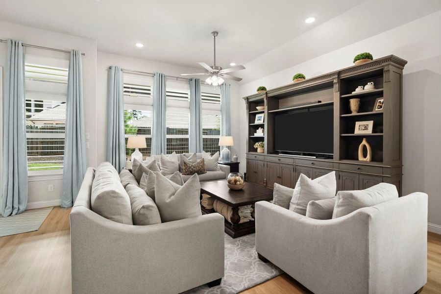 Loads of natural light in this family room Loads of natural light in this family room