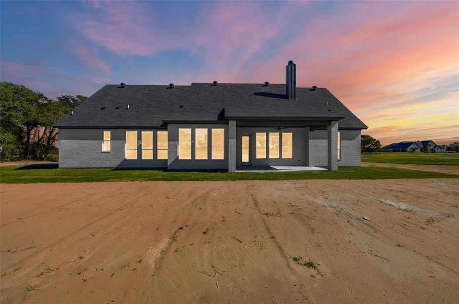 Front exterior of a new home in , Poolville, TX, highlighting curb appeal (Image 22).