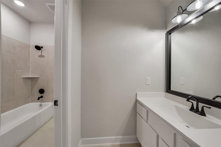 Furnished interior view inside a new home in Meridiana, Manvel (Image 10).
