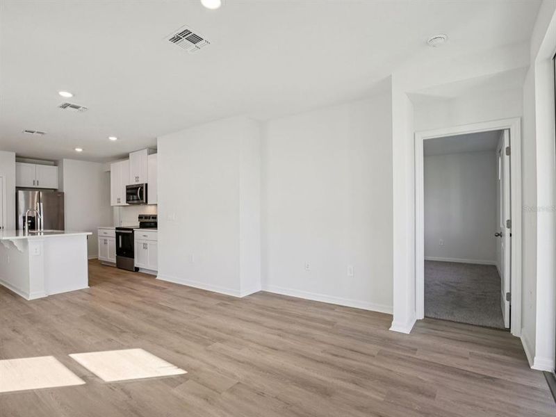 Spacious, unfurnished interior of a new home in Oakfield Trails - Premier Series, Parrish (Image 10).