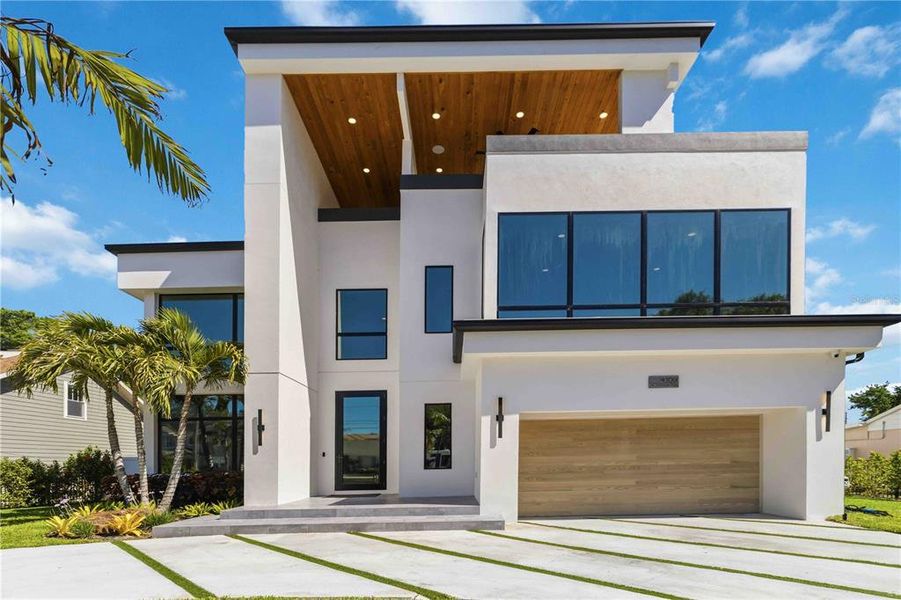 Front exterior of a new home in , Tampa, FL, highlighting curb appeal (Image 2).