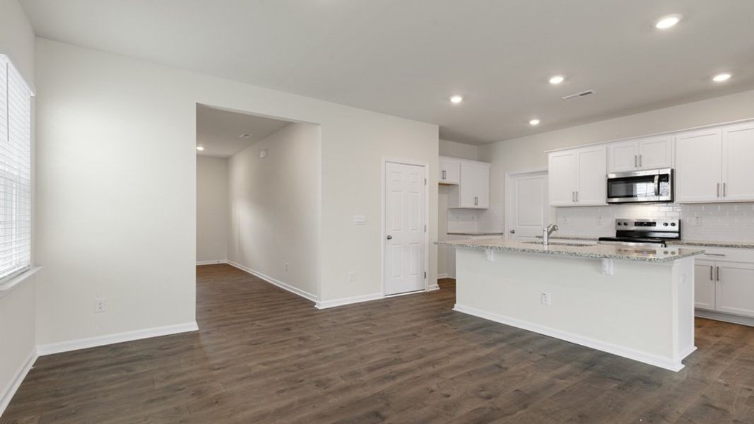 Furnished interior view inside a new home in The Grove at Matthews Landing, Fuquay Varina (Image 6).