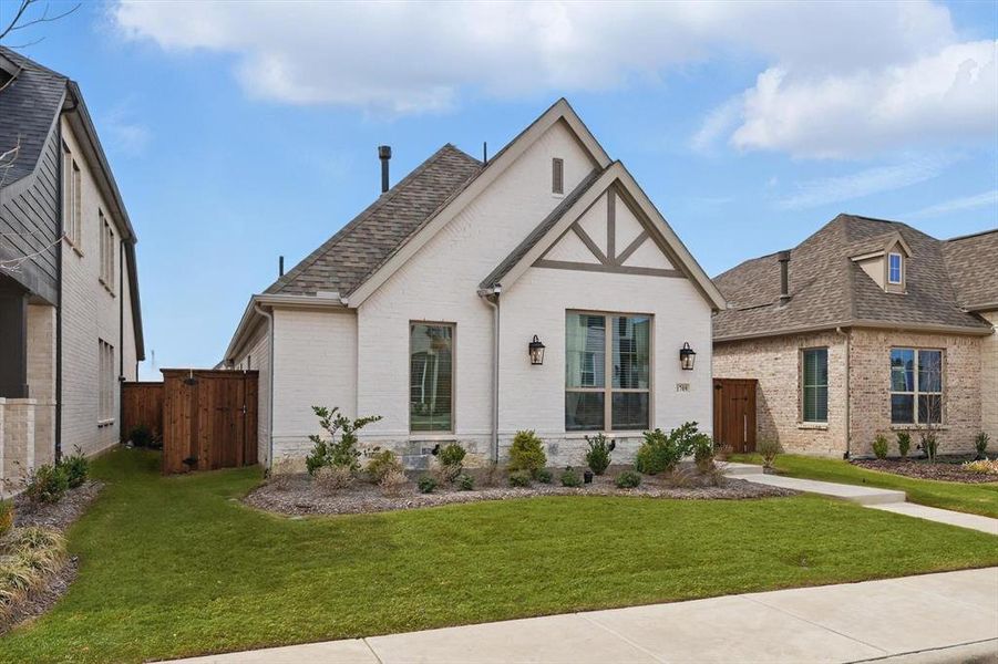 Front exterior of a new home in , Celina, TX, highlighting curb appeal (Image 19). Front exterior of a new home in , Celina, TX, highlighting curb appeal (Image 19).