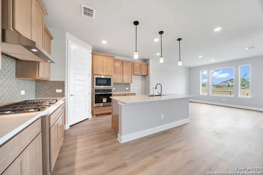 Furnished interior view inside a new home in Annabelle Ranch, San Antonio (Image 6).