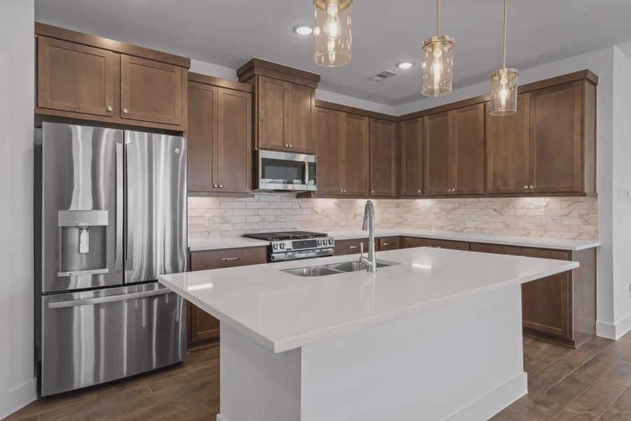 Representative furnished interior of a home built from the Carriagehouse by Chesmar Homes in Meridiana Townhomes, Iowa Colony (Image 50).