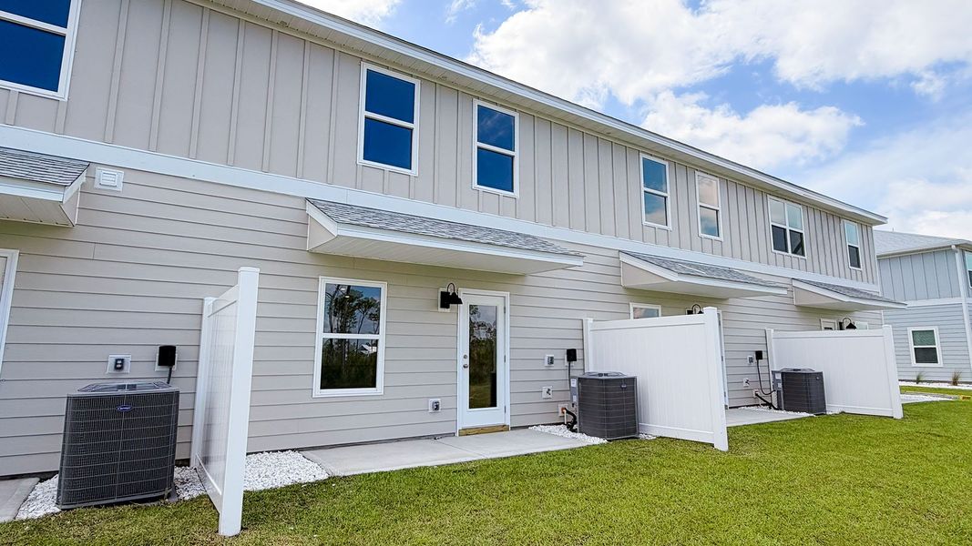 Exterior details and patio area of a home in WindMark Beach, Port Saint Joe (Image 4).