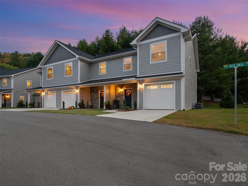 Front exterior of a new home in , Burnsville, NC, highlighting curb appeal (Image 18).