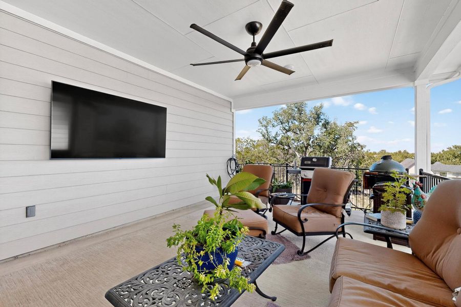 View of patio featuring a ceiling fan, area for grilling, and outdoor lounge area