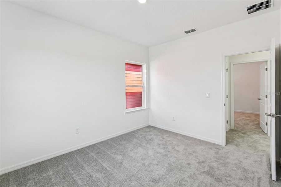 Spacious, unfurnished interior of a new home in Laureate Park at Lake Nona - Garden Series, Orlando (Image 30).