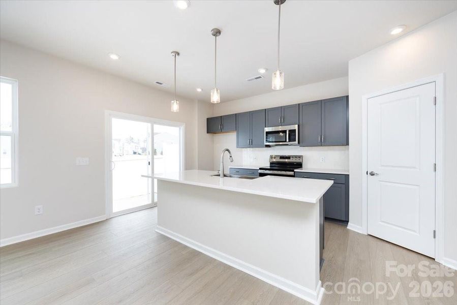 Chef Inspired Kitchen with Rich Grey Cabinets Chef Inspired Kitchen with Rich Grey Cabinets