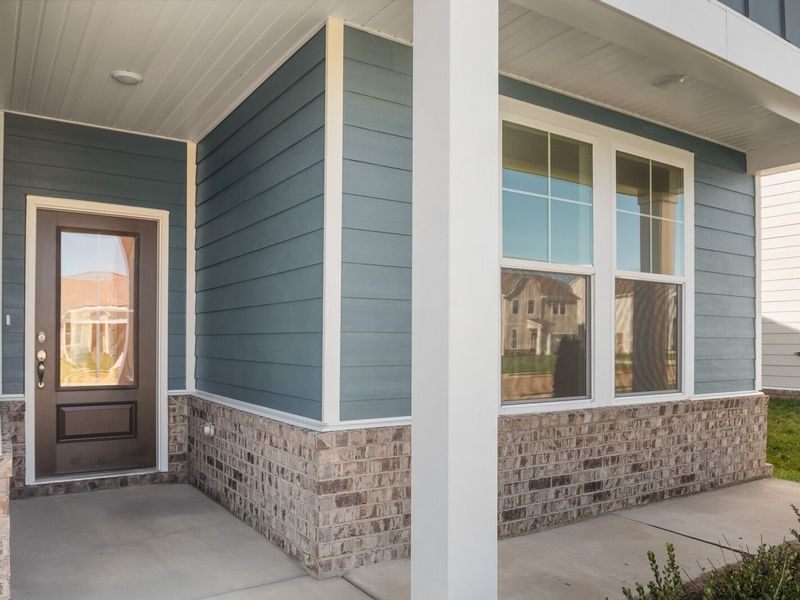 Exterior details and patio area of a home in Sage Farms, White House (Image 3).