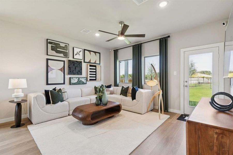 Living Room in the Magnolia home plan by Trophy Signature Homes – REPRESENTATIVE PHOTO