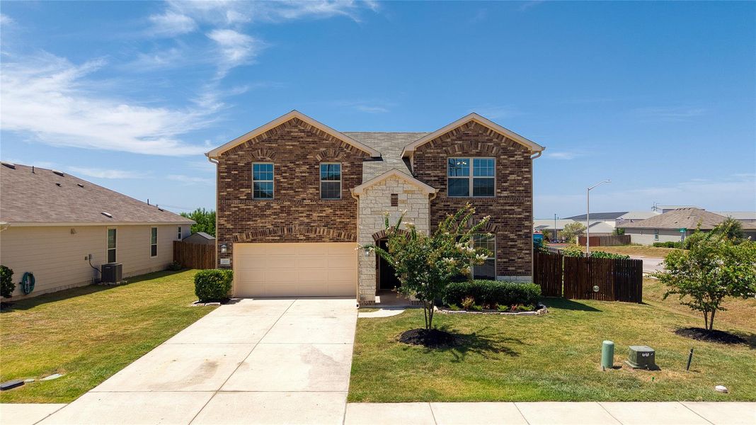 Front exterior of a new home in , Liberty Hill, TX, highlighting curb appeal (Image 25).
