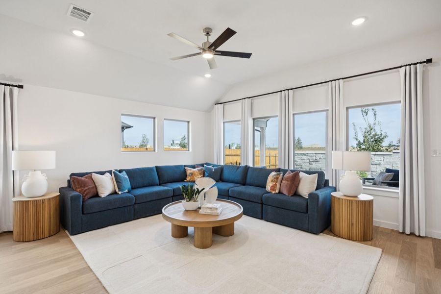 Living Room in the Diamond home plan by Trophy Signature Homes – REPRESENTATIVE PHOTO Living Room in the Diamond home plan by Trophy Signature Homes – REPRESENTATIVE PHOTO