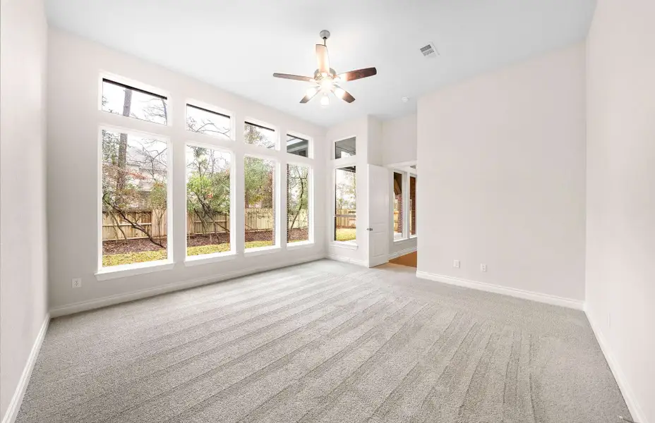 Representative unfurnished interior of a home built from the 3068 by Ravenna Homes in The Woodlands Hills 65′, Willis (Image 37).