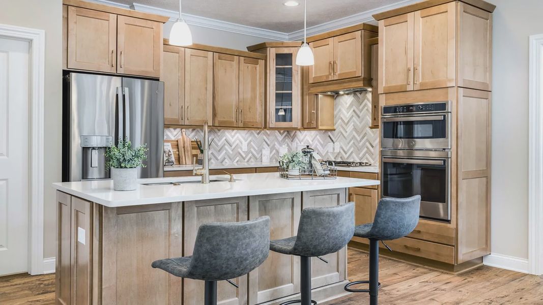 Representative furnished interior of a home built from the Capri by Epcon Communities in The Courtyards at Oak Grove, Durham (Image 16).