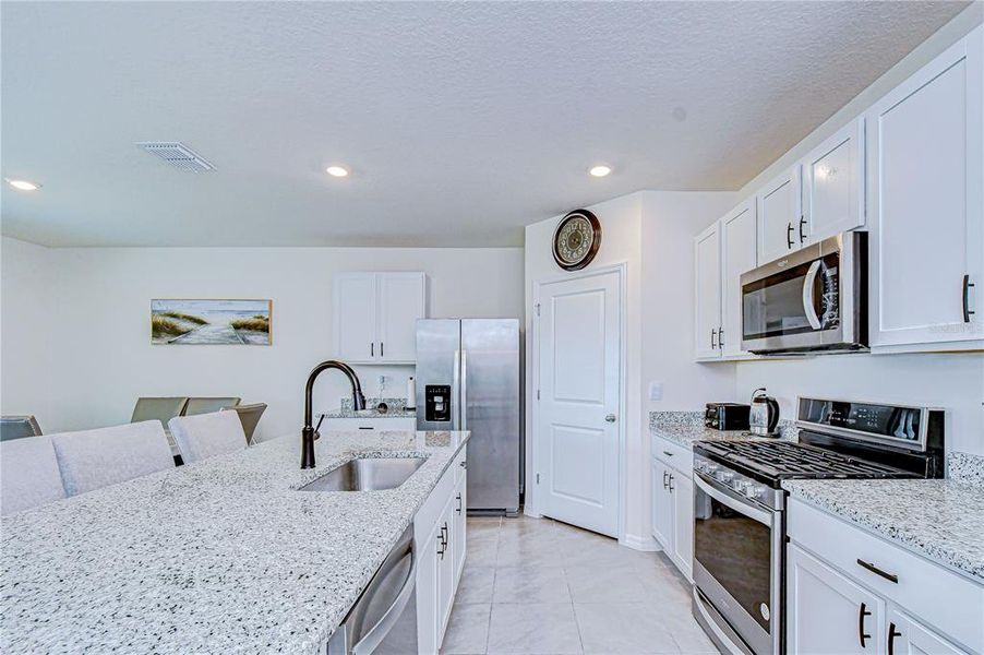 Furnished interior view inside a new home in , Zephyrhills (Image 13). Furnished interior view inside a new home in , Zephyrhills (Image 13).