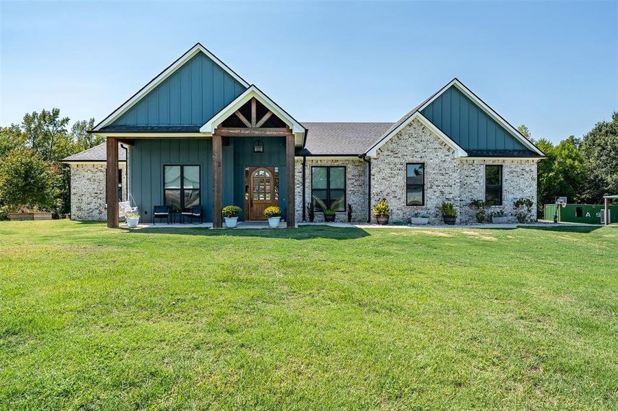 Front exterior of a new home in , Mineola, TX, highlighting curb appeal (Image 1). Front exterior of a new home in , Mineola, TX, highlighting curb appeal (Image 1).