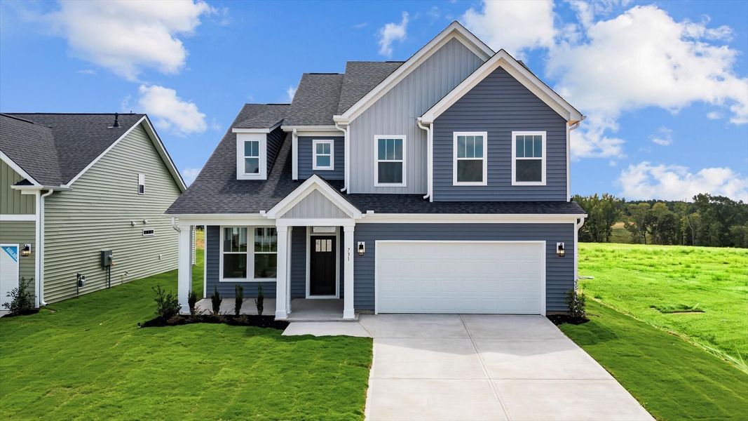 Representative exterior photo of a completed home built from the Cameron by DRB Homes in Fox Hollow, Spartanburg, SC (Image 24).