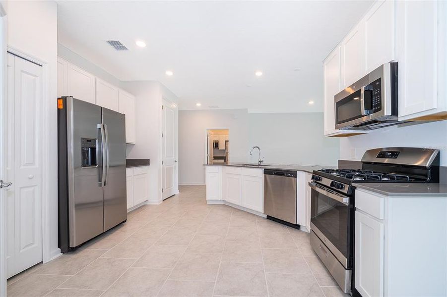 Furnished interior view inside a new home in Windsong: Estate Collection, Leesburg (Image 7).