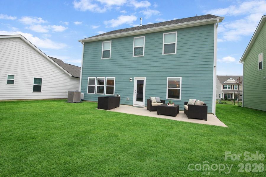 Exterior details and patio area of a home in Edgewater Lakeview On Your Lot, Lancaster (Image 27).