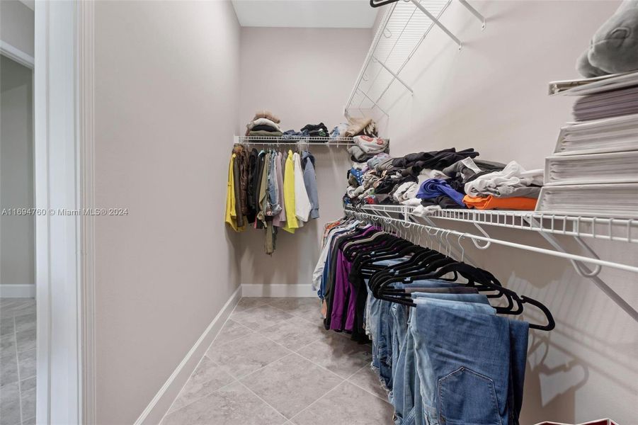 one of the primary walk in closets